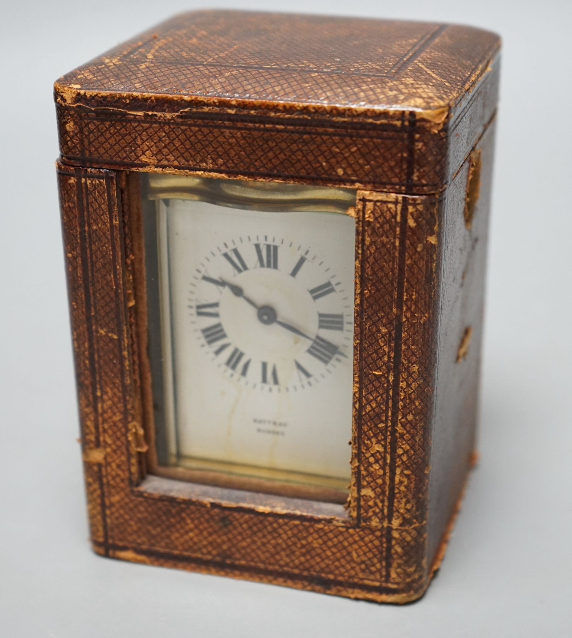 A leather cased brass carriage timepiece, Rattray, Dundee, 11cms high